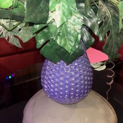 Plant In Purple Vase