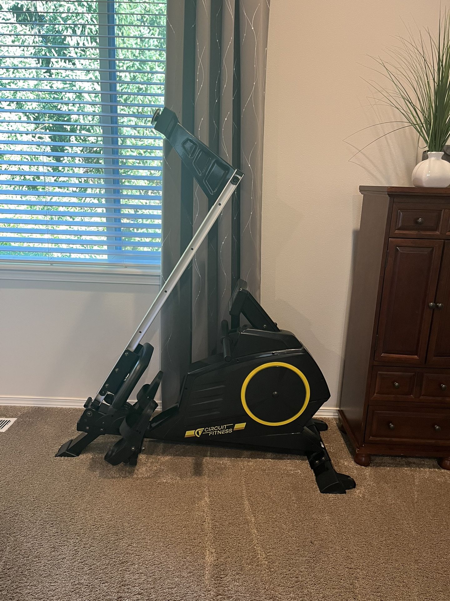 Circuit fitness rowing machine