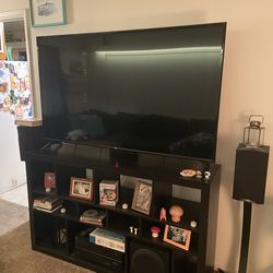 65’ LG TV with Shelving and Surround Sound Speakers
