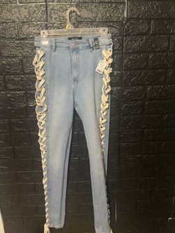 Jeans with sides cut out