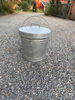 Small metal trash can