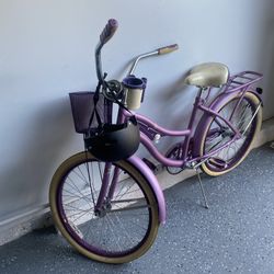 Huffy 24" Nel Lusso women's cruiser bike in purple