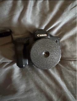 Canon M50 + Adapter + Charger + Batteries