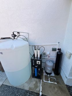 Whole house water treatment system installation.
