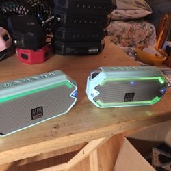 Green syncing bluetooth speakers