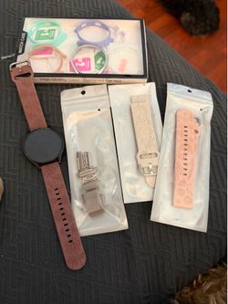 Samsung watch with bands and face protectors