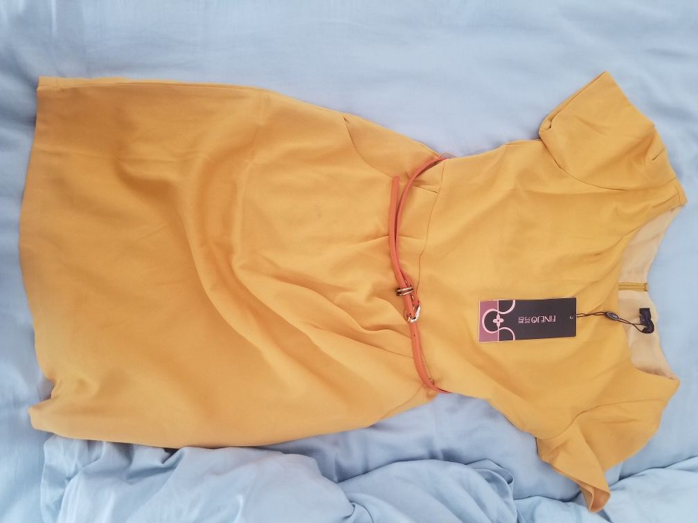 Yellow belted dress with pockets. Never been worn. XS