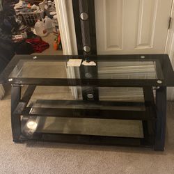 TV STAND Fits up to a 60 inch TV With Glass Shelves