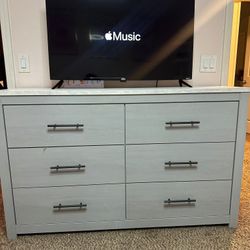 Dresser     Gray Finish Dresser with Faux Marble Top
Cottonburg Collection by Ashley Furniture