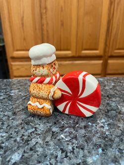 Ceramic Cracker Barrel Gingerbread Man with Ginger Mint Pair of Salt And Pepper Shakers. Preowned never used. Has been on display in a cabinet with