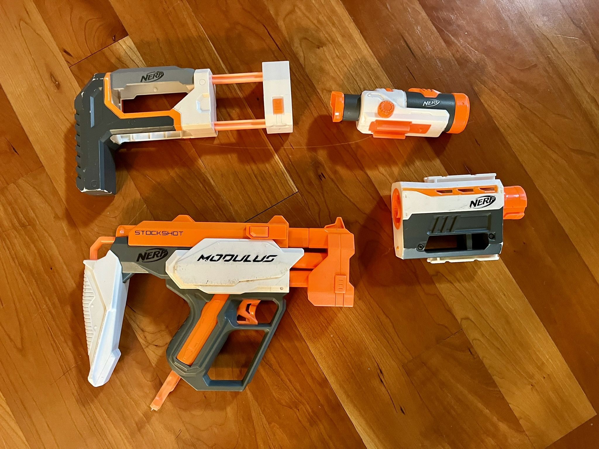 Nerf Modulus Lot Including Single Action Nerf Gun, Stock Extender, Barrel Extender And Scope.