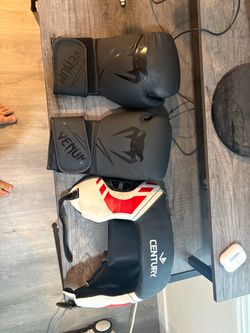12 oz boxing gloves and head gear