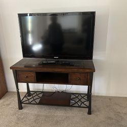 42 inch colored TV and TV stand $60