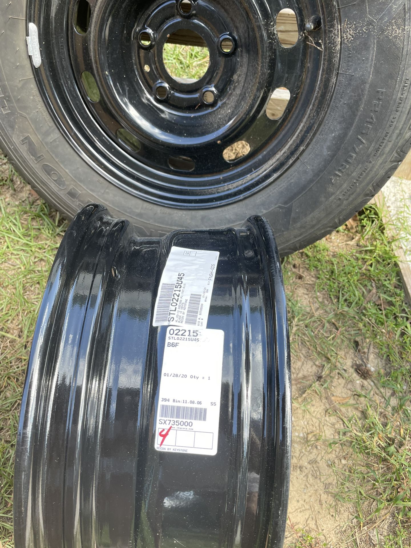 17 inch rims with (1) mounted used tire for Dodge Ram . Rims have never been put on truck. I bought rims and went to tire store and had a used tire mo