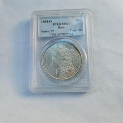 1884-O PCGS MS63 $1 COIN