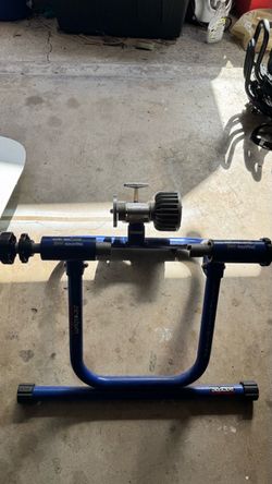 Folding bicycle trainer