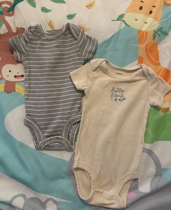 Carters onesies size NB and 3months