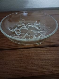 THREE FOOTED GLASS BOWL WITH LEAVES AND PINECONES