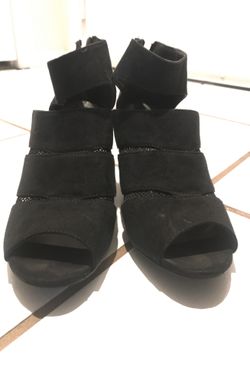 Black wedges with the zipper in the back