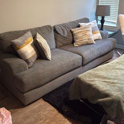 Grey Couch w/ Pillows incl 