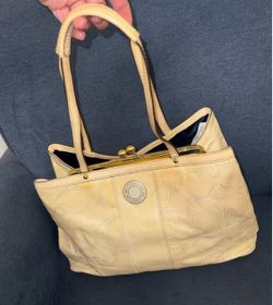Coach yellow kiss lock purse