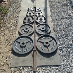 Olympic Weights 240lbs + Bar