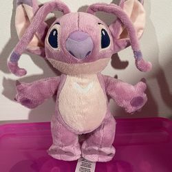 This item is a Disney Store Angel Plush from the Lilo & Stitch franchise.