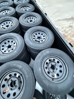 205/75R15 Tire on 5-Lug Rim
