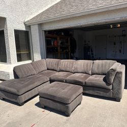Grey Sueded Sectional Piece With Ottoman