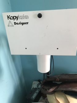 Kopykake designer tabletop projector with air gun and over 500 clip art designs