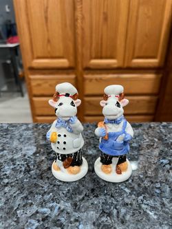 Ceramic Cow Chef pair of salt and pepper shakers.  Size approximately 4 inches tall.  Brand new never used.