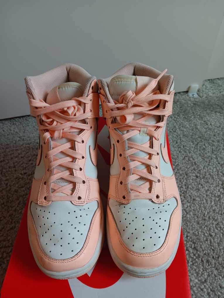 Nike Dunk High Crimson Tint sneakers.