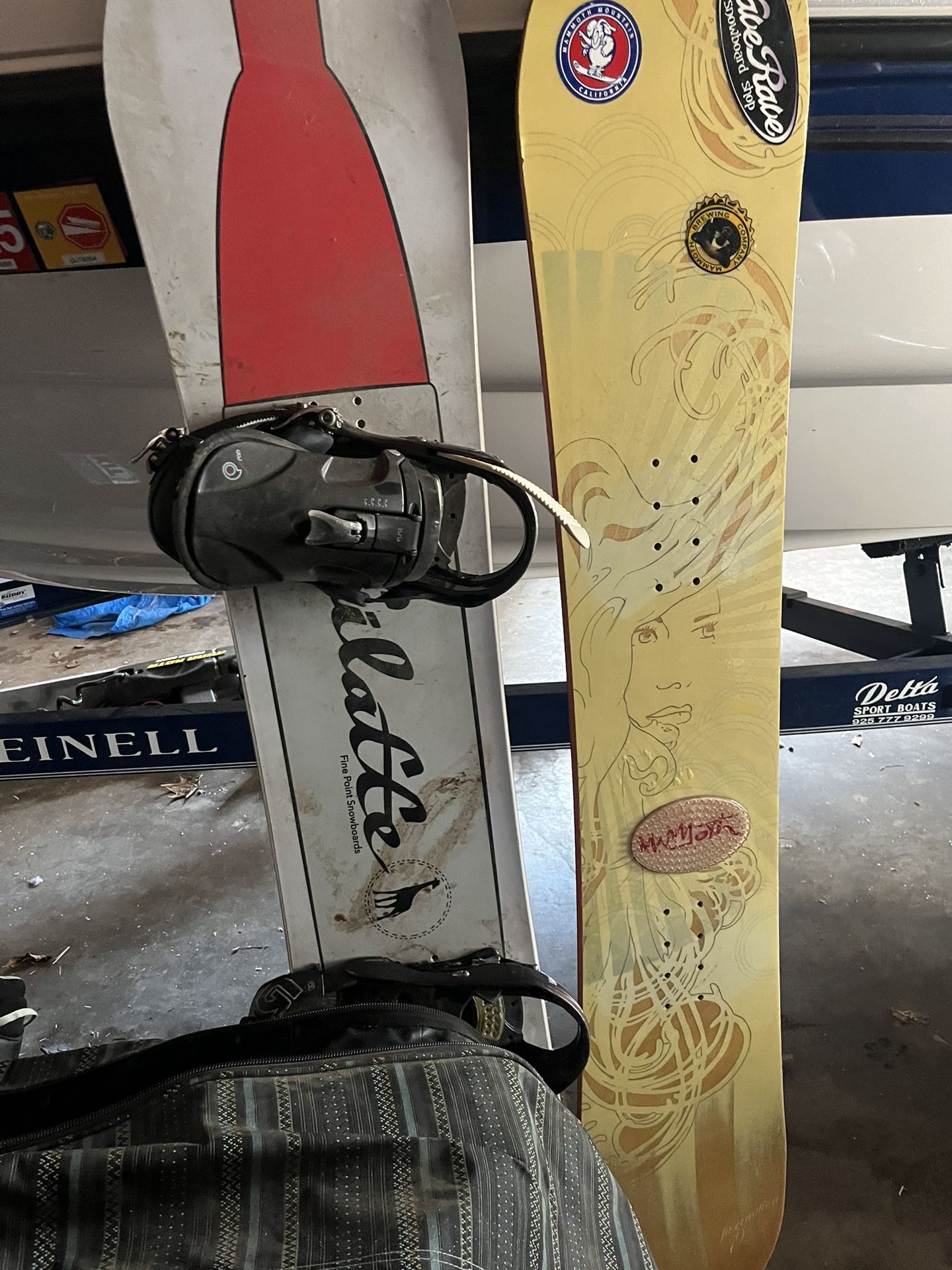 Two Snowboards For Sale With Boots And One Snowboard Bag