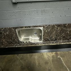 9ft long Counter Top 25 inches wide.  N Sink 