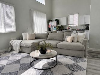 2 Piece Gray Living Spaces Sectional Couch