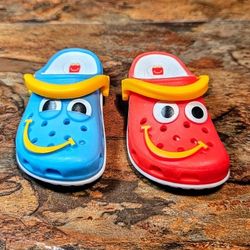 2-Lot McDonald's Happy Meal Mini Crocs • These Are Collectable Minature Crocs Key Chains • Stylized Faces With Vibrant Colors ( Red / Blue • These Res