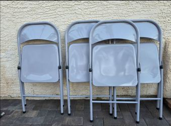 4 New Folding Chairs