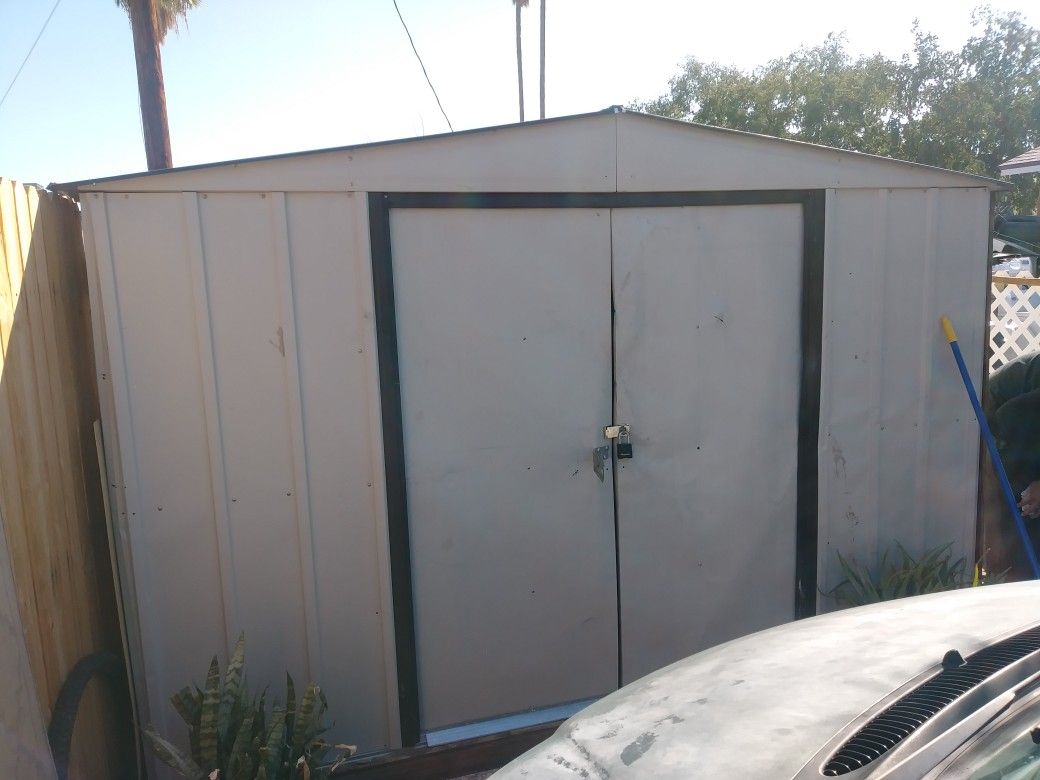 8 x10. Storage shed with wooden floor