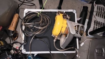 Electric Circular Saw Yellow and Gray tile