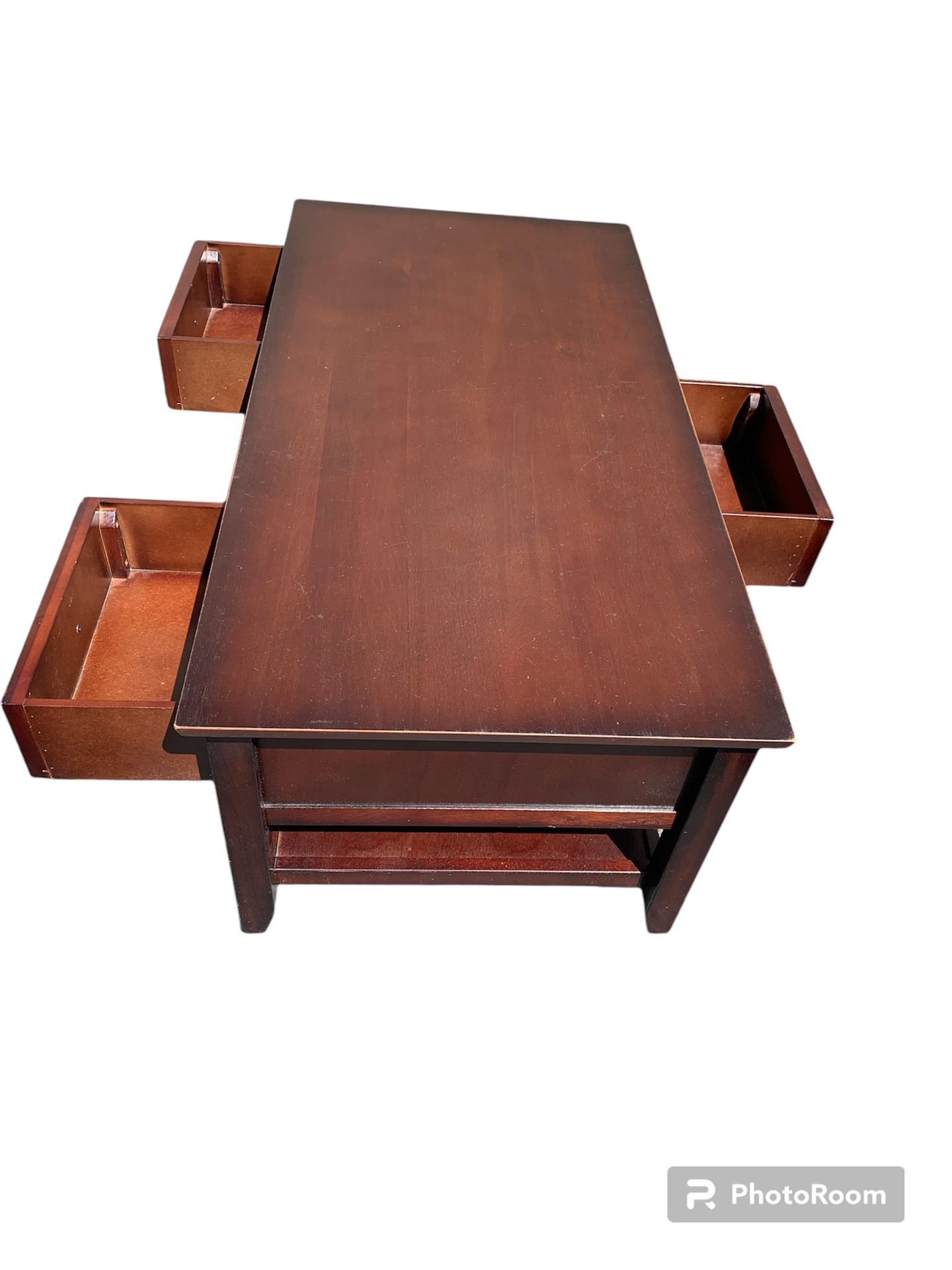 Coffee table with 3 drawers that open to both sides.  45 3/4 W x 23 1/4 D x 18 1/2 H 
