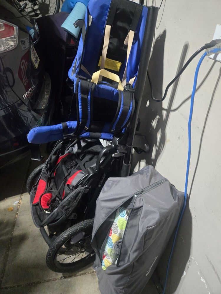 Baby lot, babytrend pack n play, jogging stroller (raceteck) and kelty kids hiking backpack.