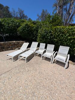 Two sun loungers and four matching outdoor chairs