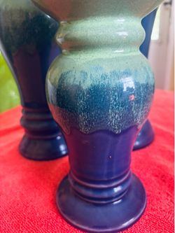 A set of three candleholders or just use as faces