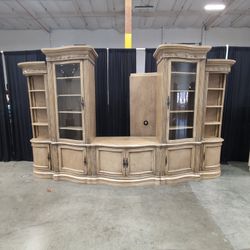 Distressed Beige Traditional Entertainment Center with Glass Doors