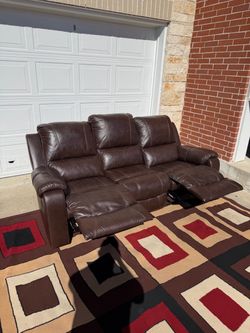 Brown leather reclining couch (manual)