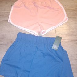 Womens Activewear Shorts 2 Pairs Size Small , Blue Amd Light Pink New With Tags