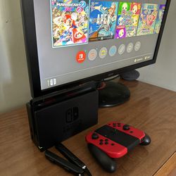 Nintendo Switch w/ 2 Red JoyCons