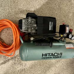 Hitachi EC12 Portable 4-Gallon Twin Stack Air Compressor. 