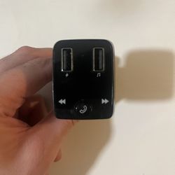 Bluetooth FM transmitter and charging outlet