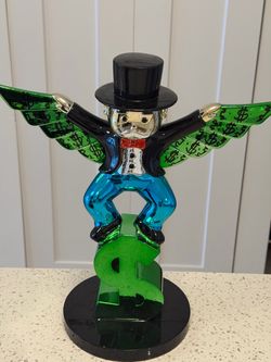 Alec monopoly statues